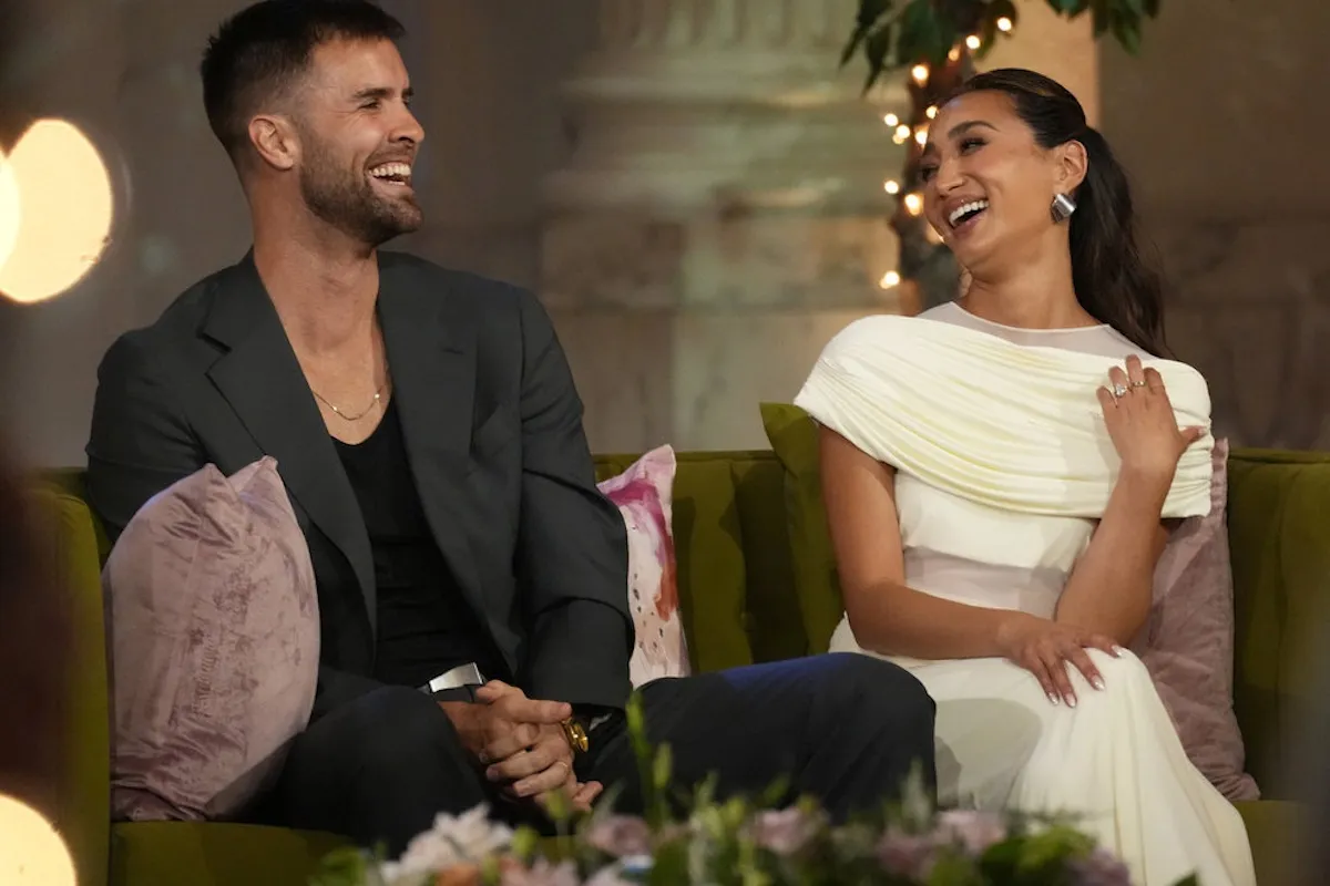 Smiling Cameron and Michelle on stage during the 'Married at First Sight' Season 20 reunion