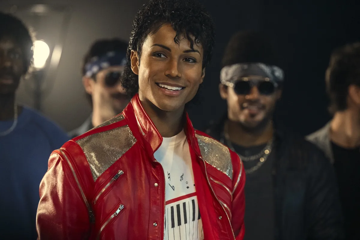 Jaafar Jackson, in a red jacket, in 'Michael'