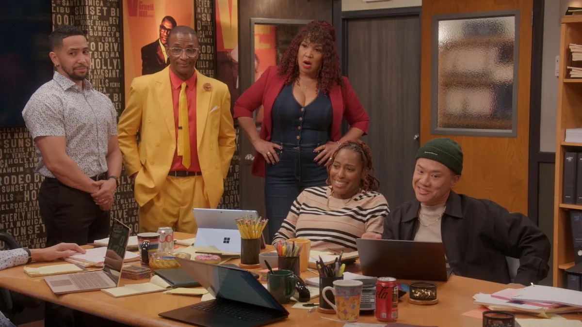 The cast of The Varnell Hill Show' sitting around a table