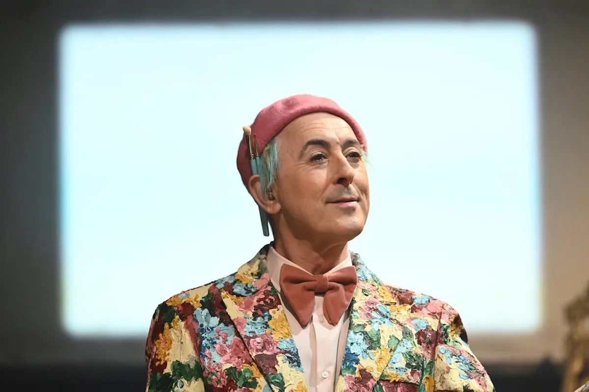 Alan Cumming in a floral patterned jacket in 'The Traitors'