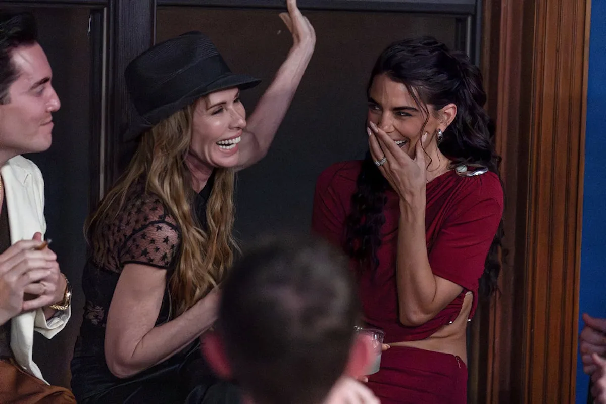 Carole Radziwill waving her arm while standing next to Erika Hammond on 'RHONY'