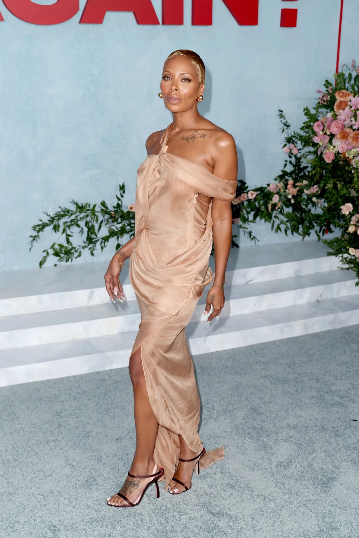 Eva Marcille in a nude chiffon gown