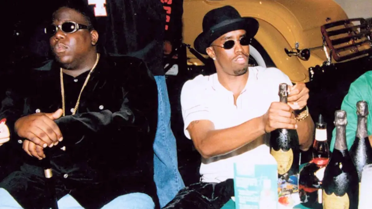 Notorious BIG and Sean 'Diddy' Combs at a party