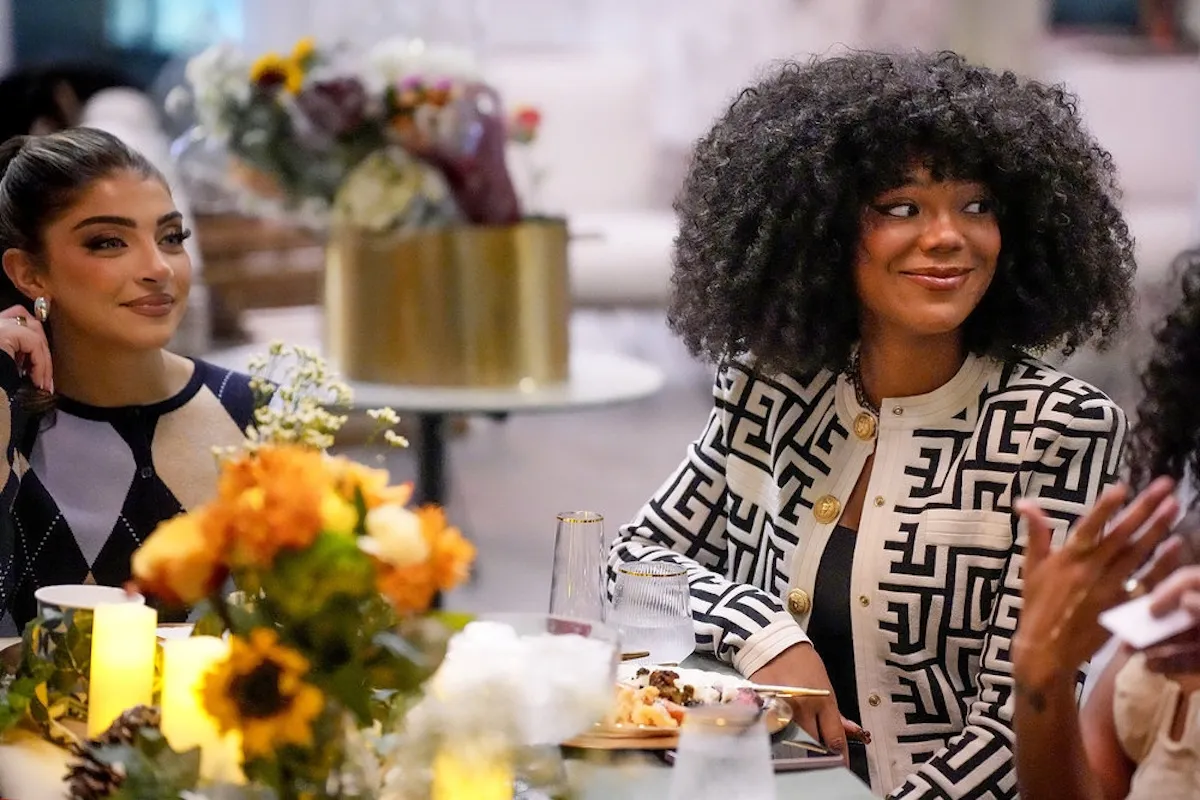 Smiling Riley Burruss sitting next to Gia Giudice in 'Next Gen NYC'