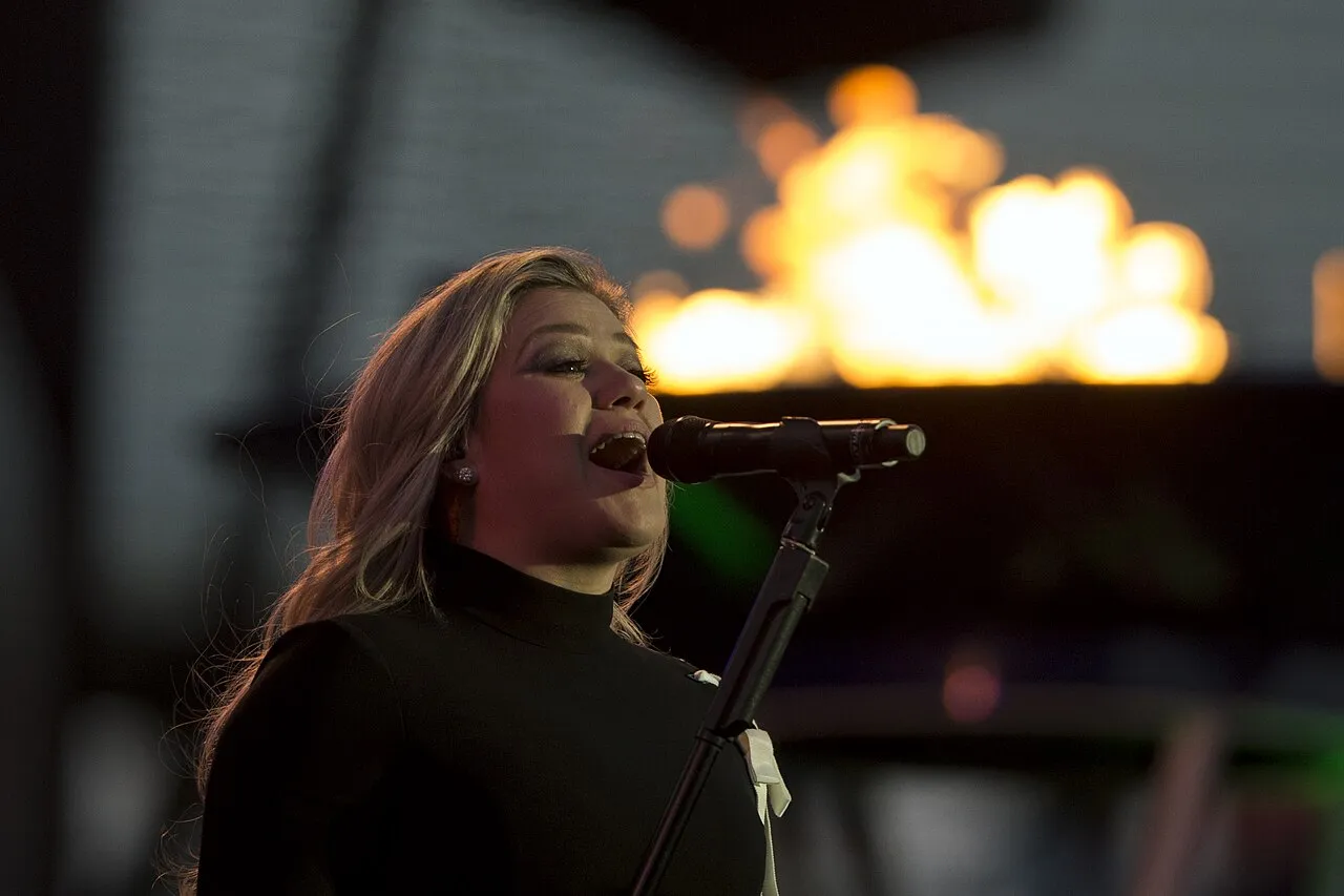Kelly Clarkson performs during opening ceremonies for the 2018 Warrior Games at the Air Force Academy in Colorado Springs, Colo. June 2, 2018.