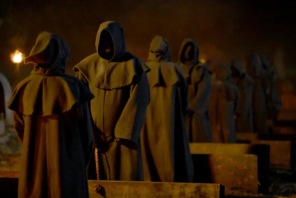 Contestants on 'The Traitors: New Blood' wear robes.