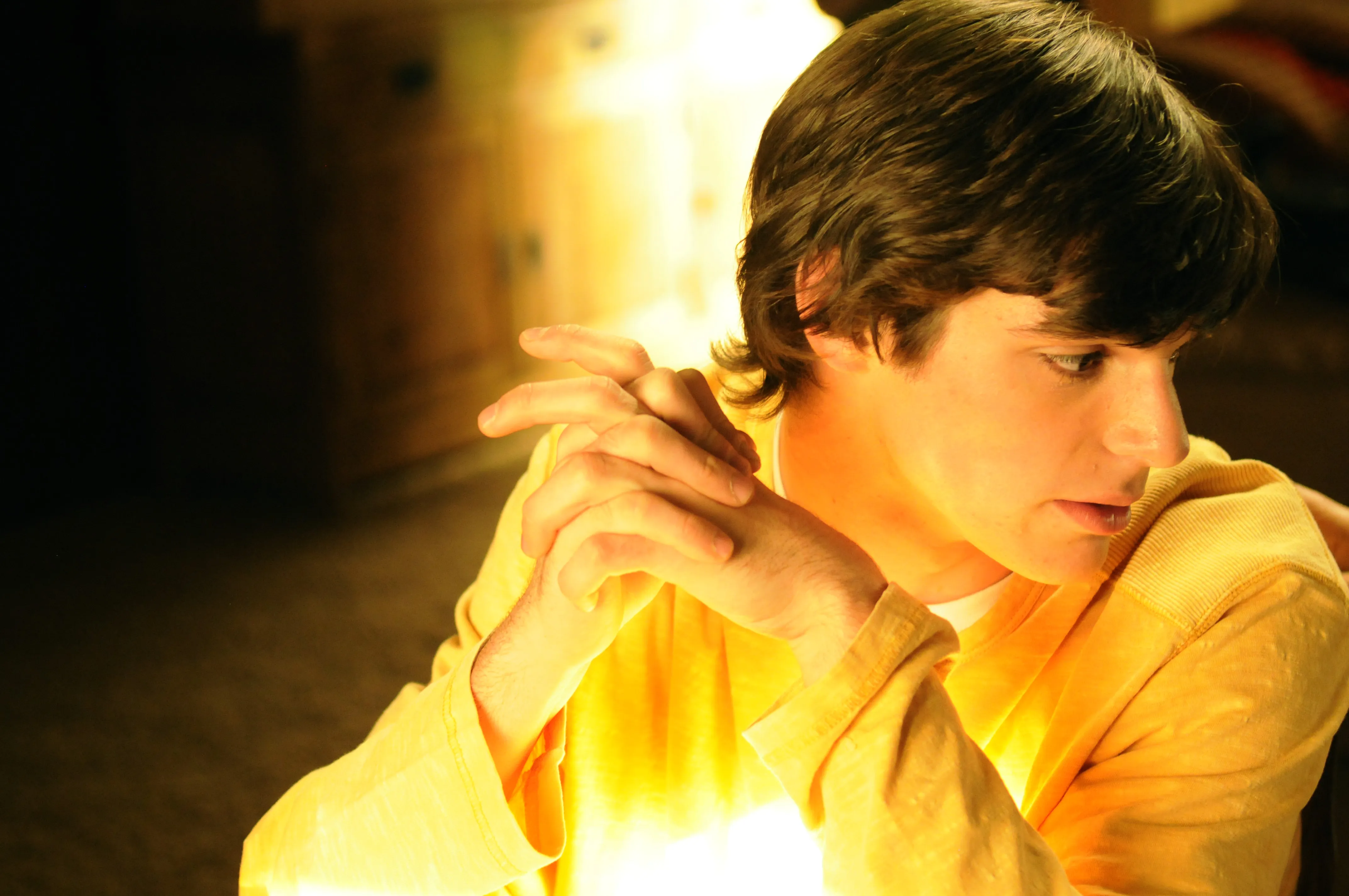 RJ Mitte in profile in yellow sweatshirt in 'Breaking Bad'