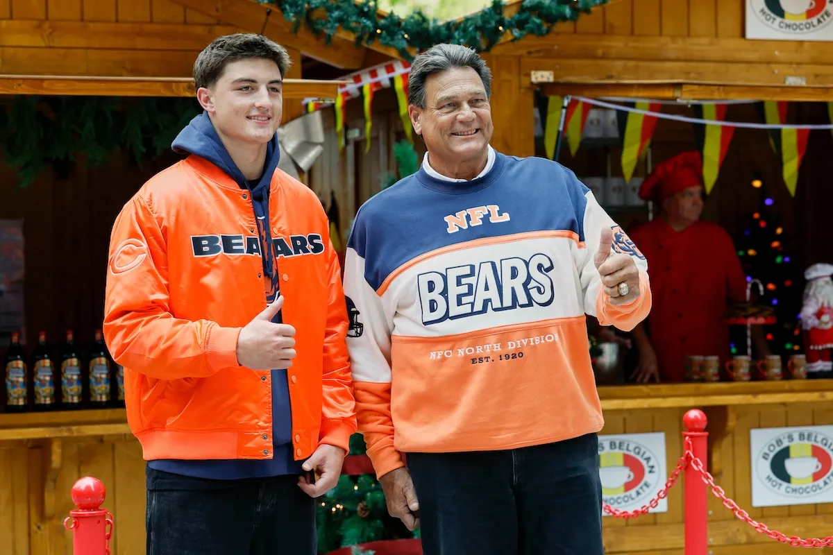 Colston Loveland and Dan Hampton wearing Bears gear in 'Holiday Touchdown: A Bears Love Story' on Hallmark
